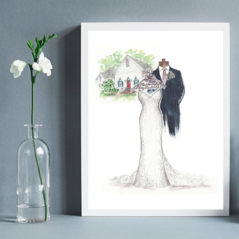 Sketch of a wedding dress and suit in a frame.