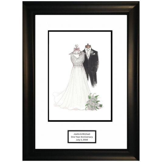 A framed sketch of a bride and groom in wedding attire, with a bouquet and a suit, marked with the names 'Jessica & Michael' and labeled as a 'One Year Anniversary' gift.